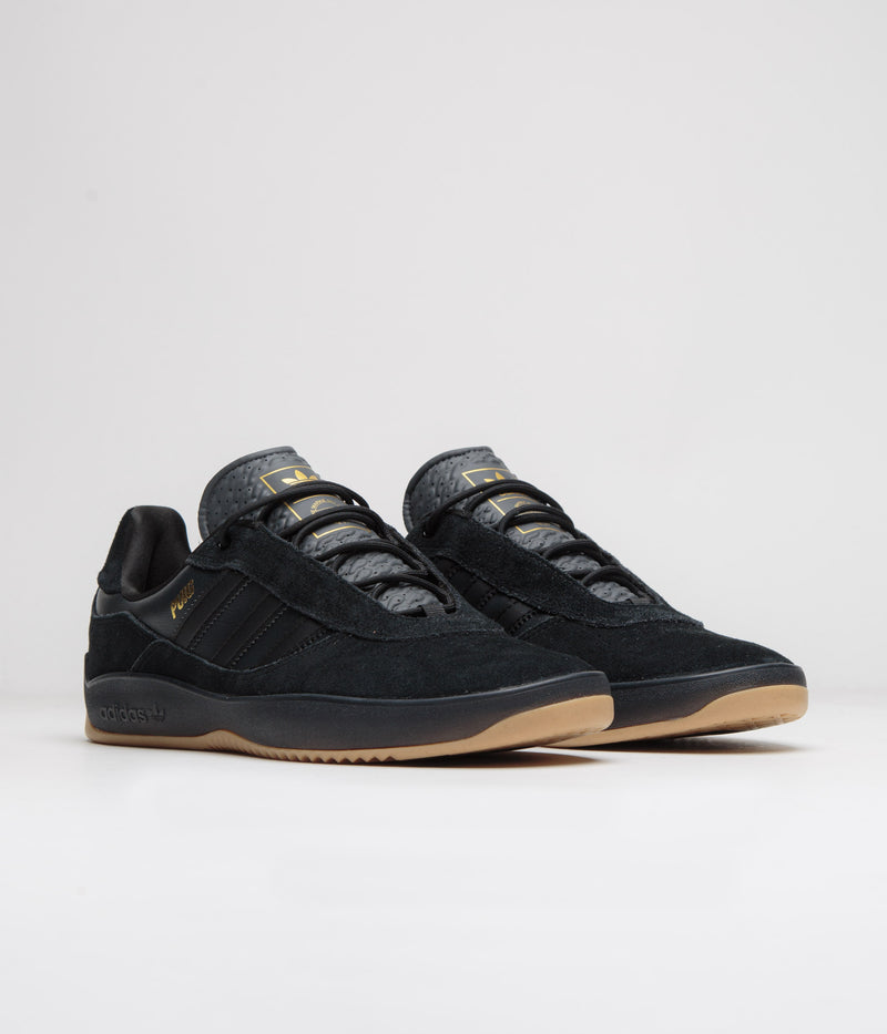 Adidas Puig Shoes in Core Black and Carbon / Gold Metallic