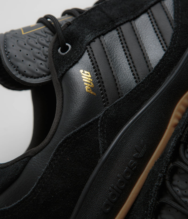 Adidas Puig Shoes in Core Black and Carbon / Gold Metallic