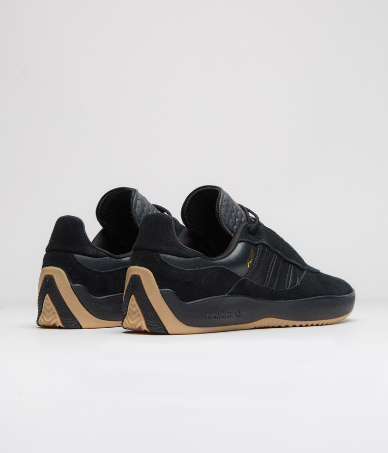 Adidas Puig Shoes in Core Black and Carbon / Gold Metallic