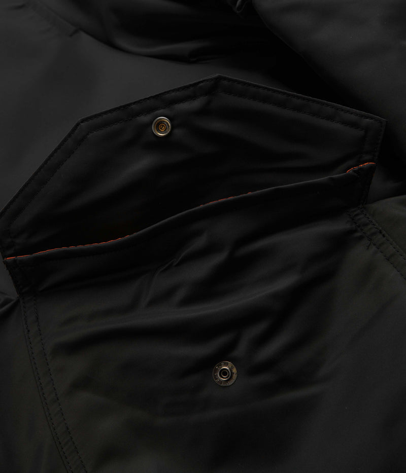 Carhartt Olten Bomber Jacket in Black and Turmeric