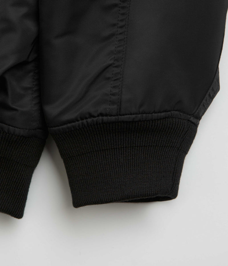 Carhartt Olten Bomber Jacket in Black and Turmeric