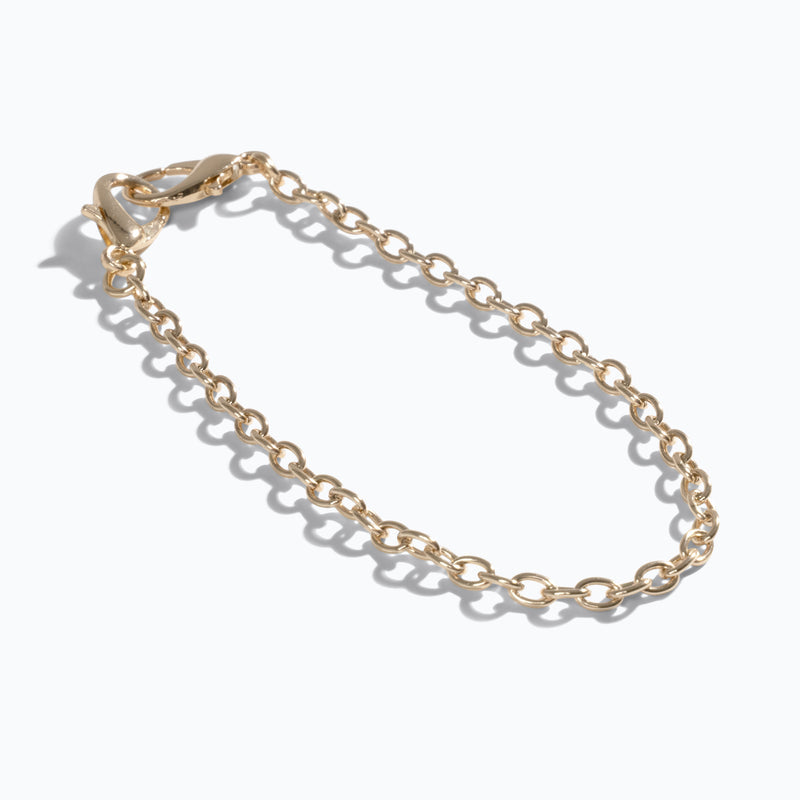 Xero Shoes Gold Chain Single Shoe Charm Facing to the Right and Slightly Forward