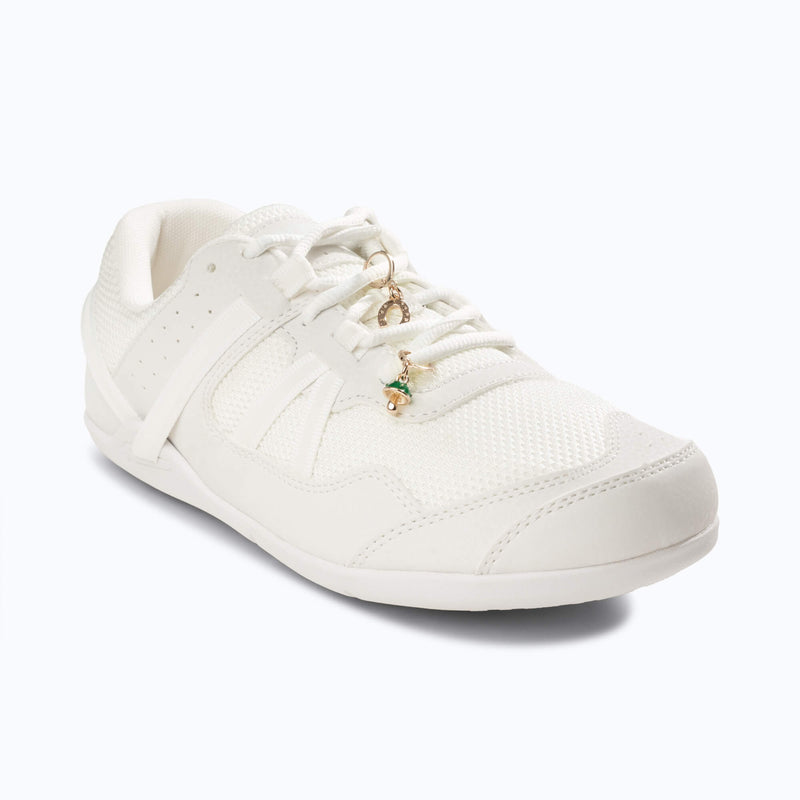 Xero Shoes White Sneaker with 2 'Good Vibes' Shoe Charm Facing to the Right and Slightly Forward