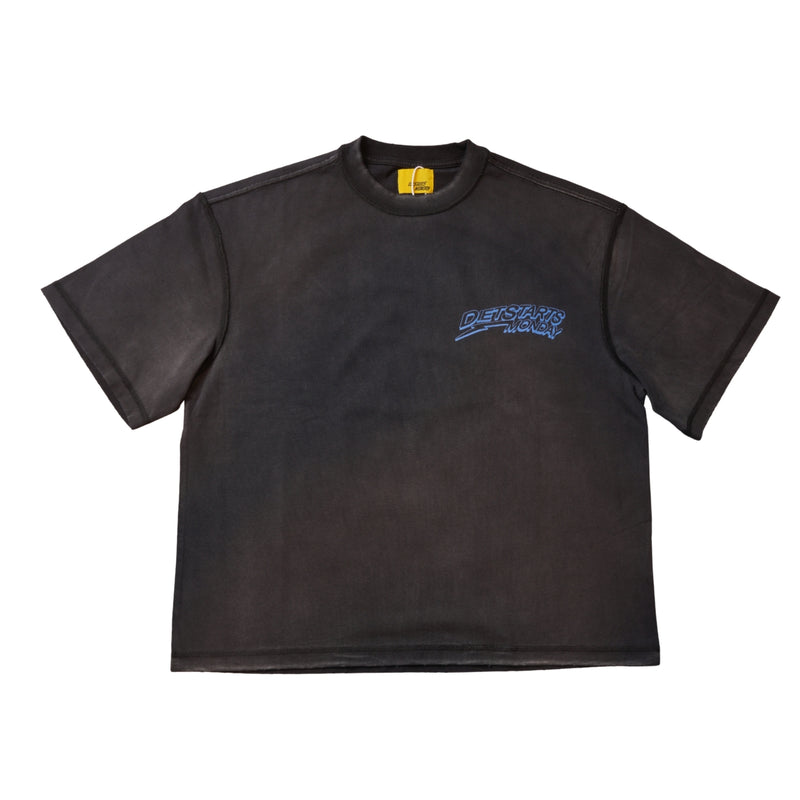Front View of the Diet Starts Monday Shield Tee in Vintage Black / Blue