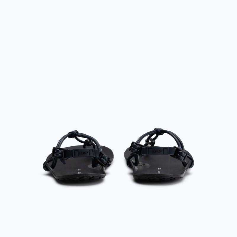 Xero Shoes Literary Sport Genesis - Unisex Sandal in Black (Pair) with Rear-facing Heel View.