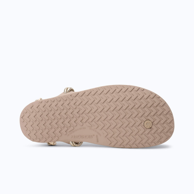 Xero Shoes Genesis Leather Women Sandal in Beige with Gold Strap and with Outsole Visible and Toe Facing Right