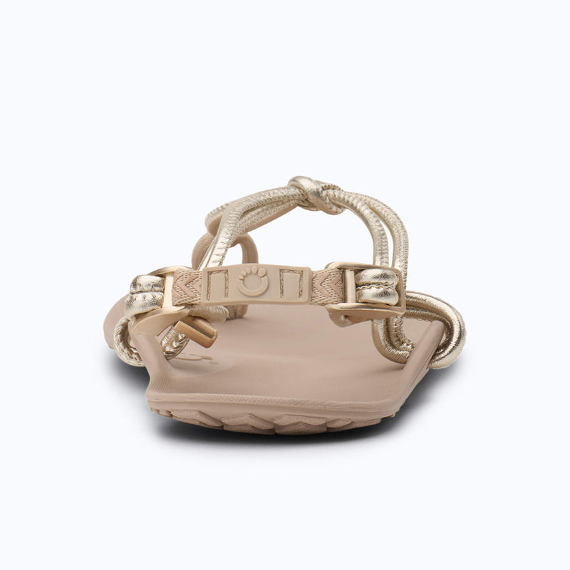 Xero Shoes Genesis Leather Women Sandal in Beige with Gold Strap and with Toe Facing Back