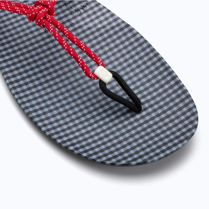 Xero Shoes Genesis x J. Crew Women Sandal in Black and Blue Gingham Pattern with Red Strap Top View with Toe Facing Bottom Right