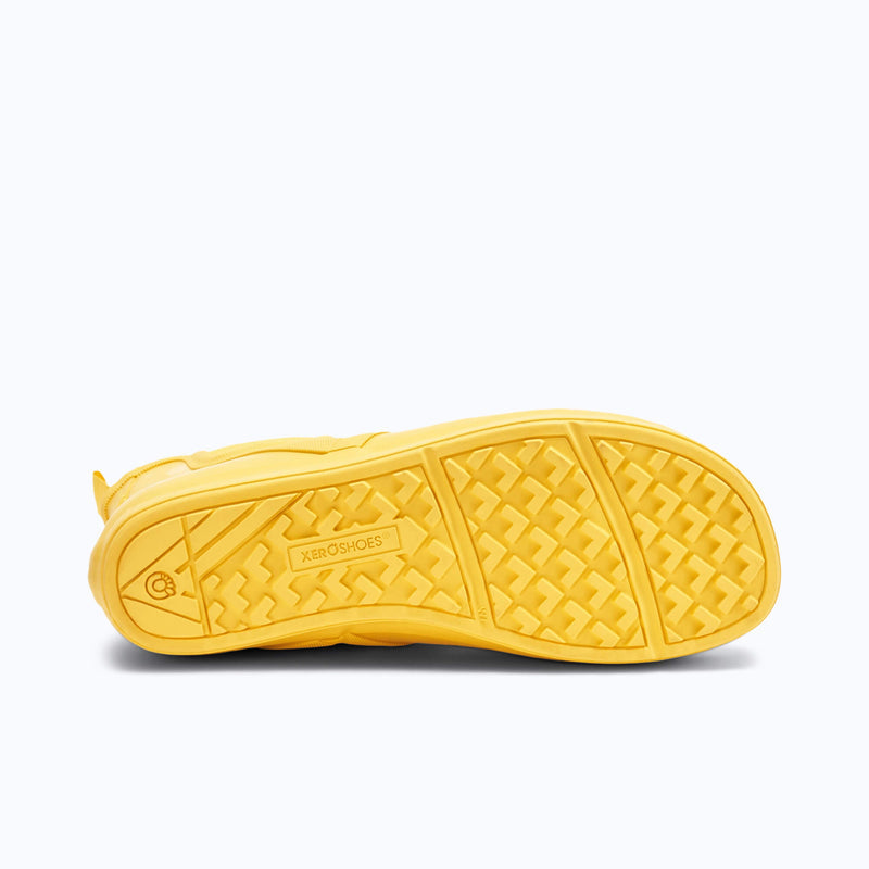 Xero Shoes Women's Gracie Barefoot Rain Boot Outsole in Yellow with Toe Facing Right