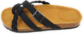 Sandal with black strap and buckle on a beige sole