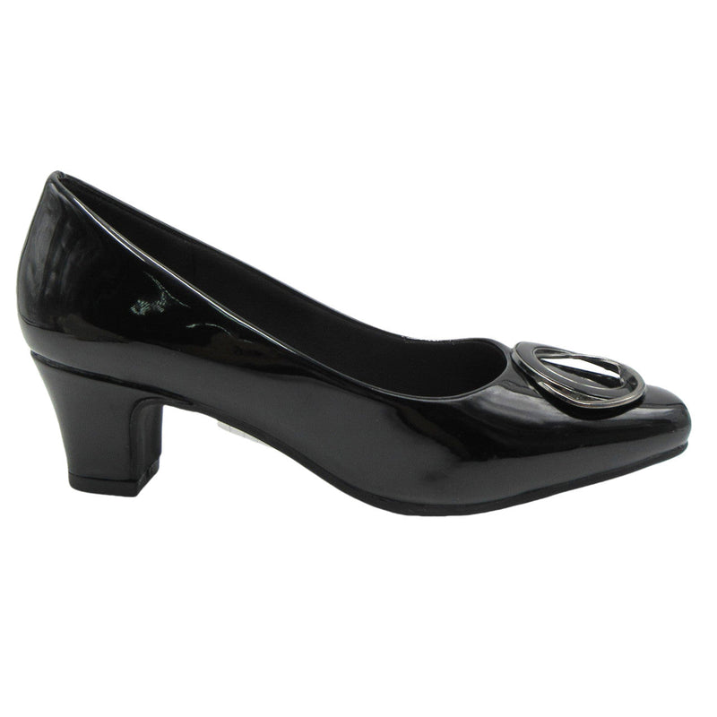 Black patent leather shoe with a low heel on a white background