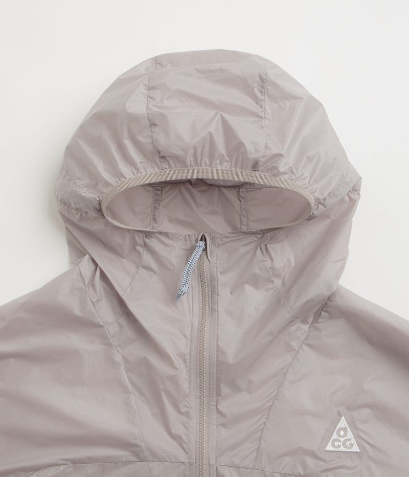 Nike ACG Cinder Cone Windproof Jacket in College Grey and Summit White