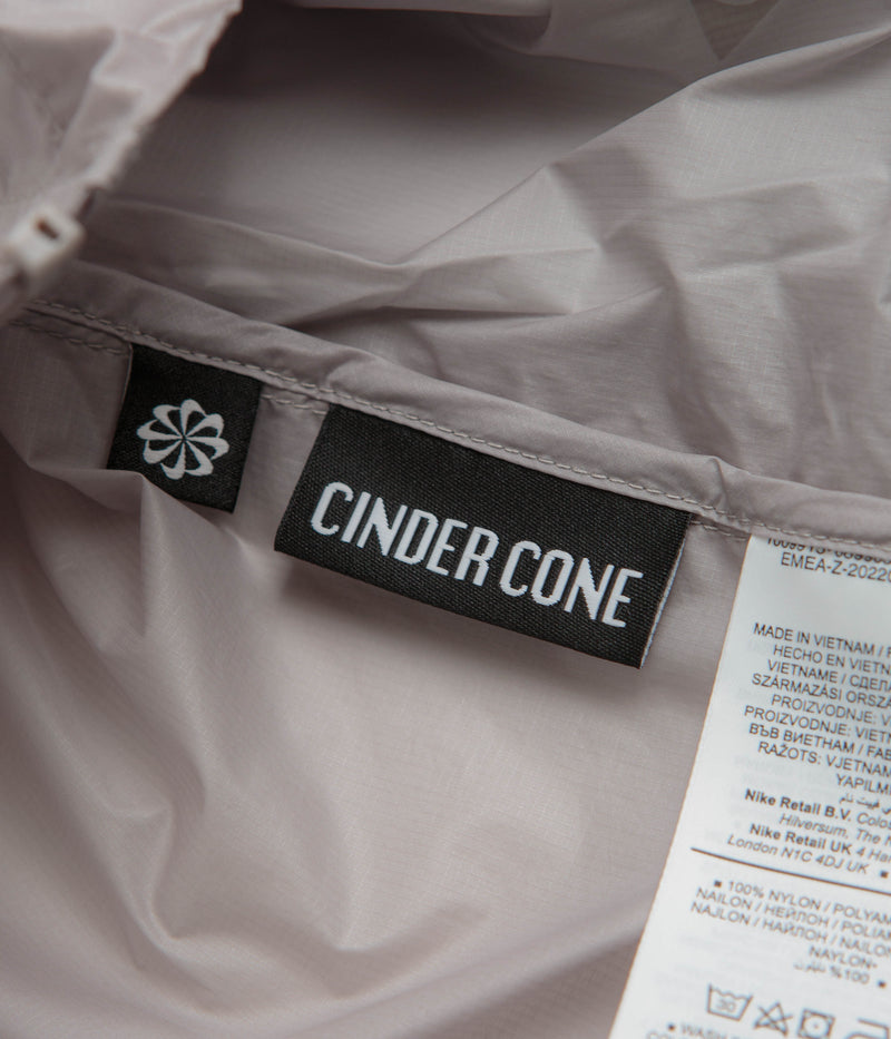 Nike ACG Cinder Cone Windproof Jacket in College Grey and Summit White