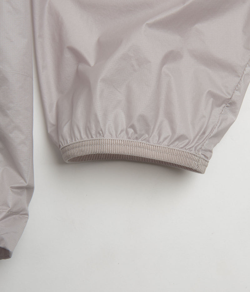 Nike ACG Cinder Cone Windproof Jacket in College Grey and Summit White