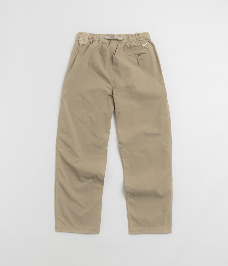 Nike ACG Hiking Pants in Khaki and Light Iron Ore / Summit White