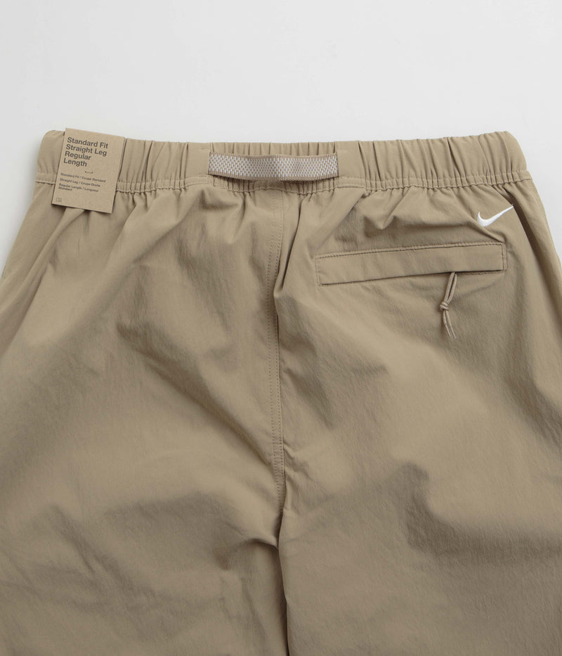 Nike ACG Hiking Pants in Khaki and Light Iron Ore / Summit White