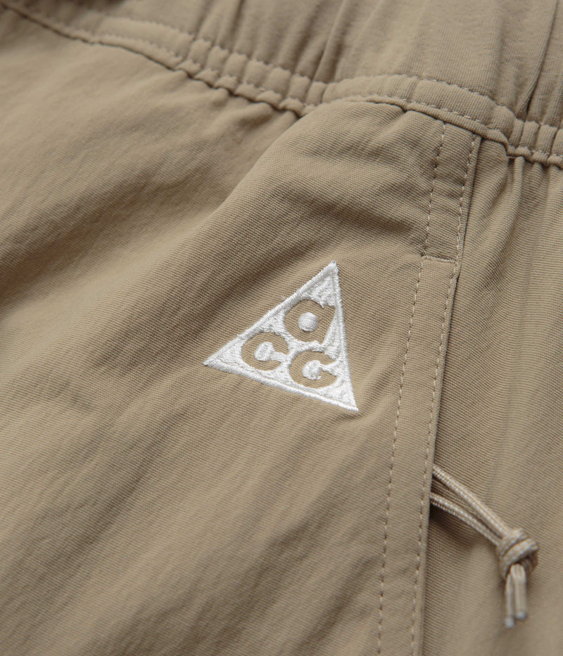 Nike ACG Hiking Pants in Khaki and Light Iron Ore / Summit White