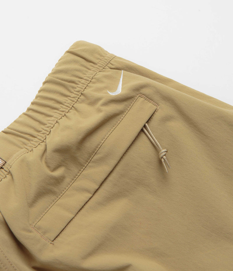 Nike ACG Hiking Pants in Parachute Beige and Summit White