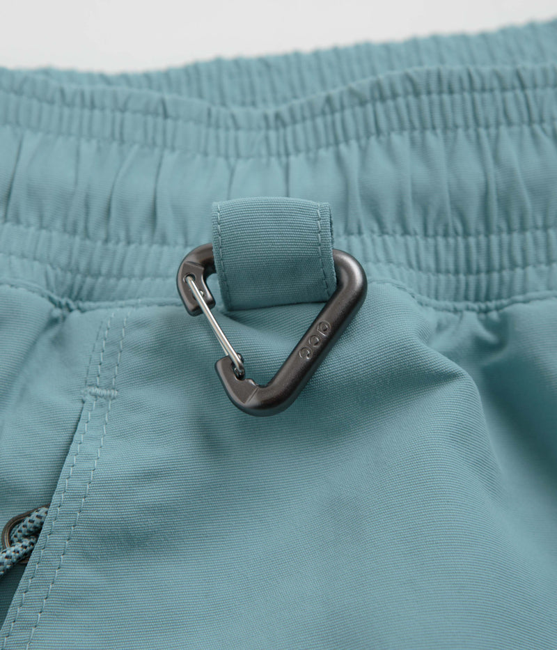 Nike ACG Reservoir Goat Shorts in Denim Turquoise and University Red / Summit White