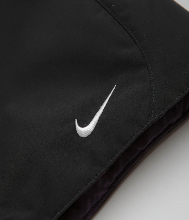 Nike ACG Skull Peak Reversible Vest in Black and Dark Raisin / Summit White