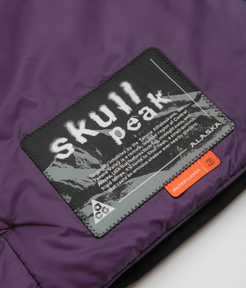 Nike ACG Skull Peak Reversible Vest in Black and Dark Raisin / Summit White