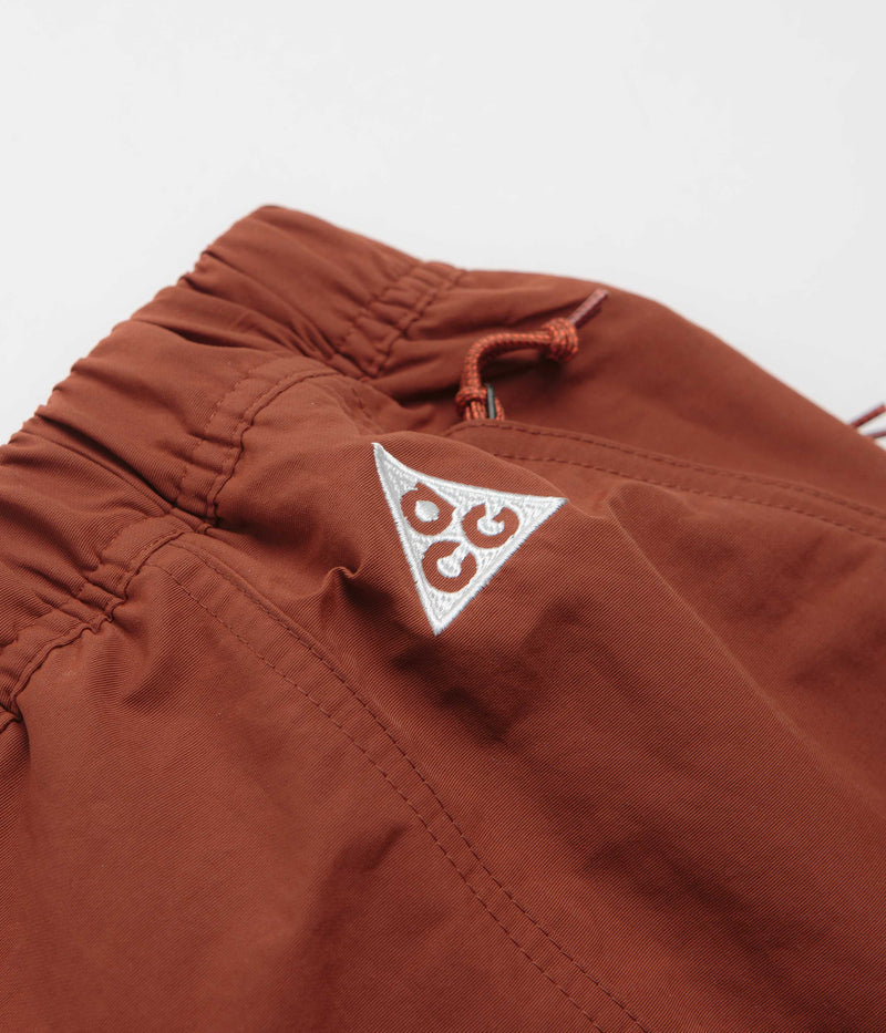 Nike ACG Snowgrass Cargo Shorts in Cinnamon and Picante Red / Summit White