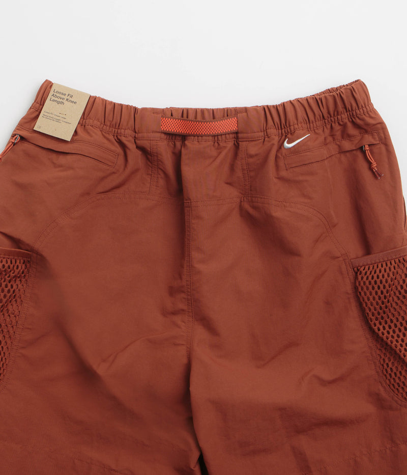 Nike ACG Snowgrass Cargo Shorts in Cinnamon and Picante Red / Summit White