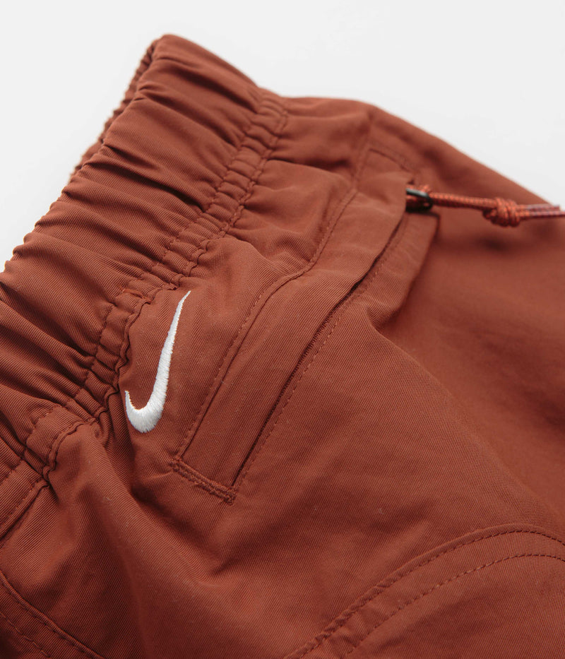 Nike ACG Snowgrass Cargo Shorts in Cinnamon and Picante Red / Summit White