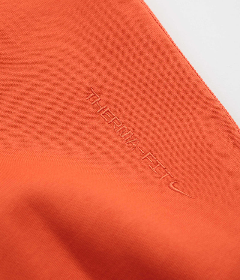 Nike ACG Therma-FIT Fleece Hoodie in Picante Red and Cinnamon / Summit White