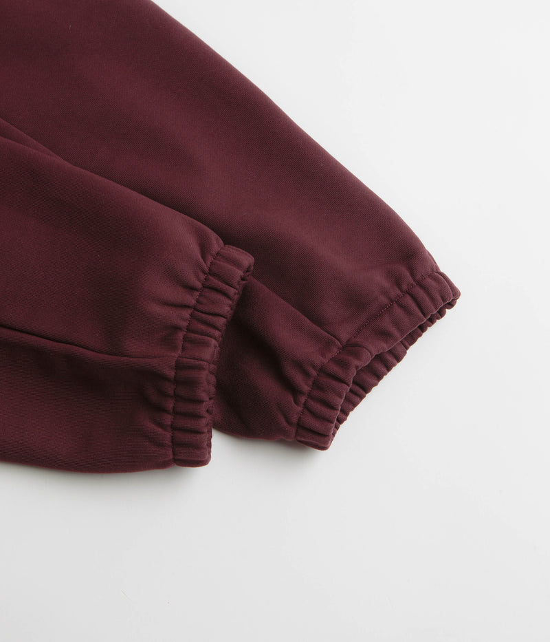 Nike ACG Tuff Fleece Lungs Pants in Burgundy Crush and Laser Fuchsia