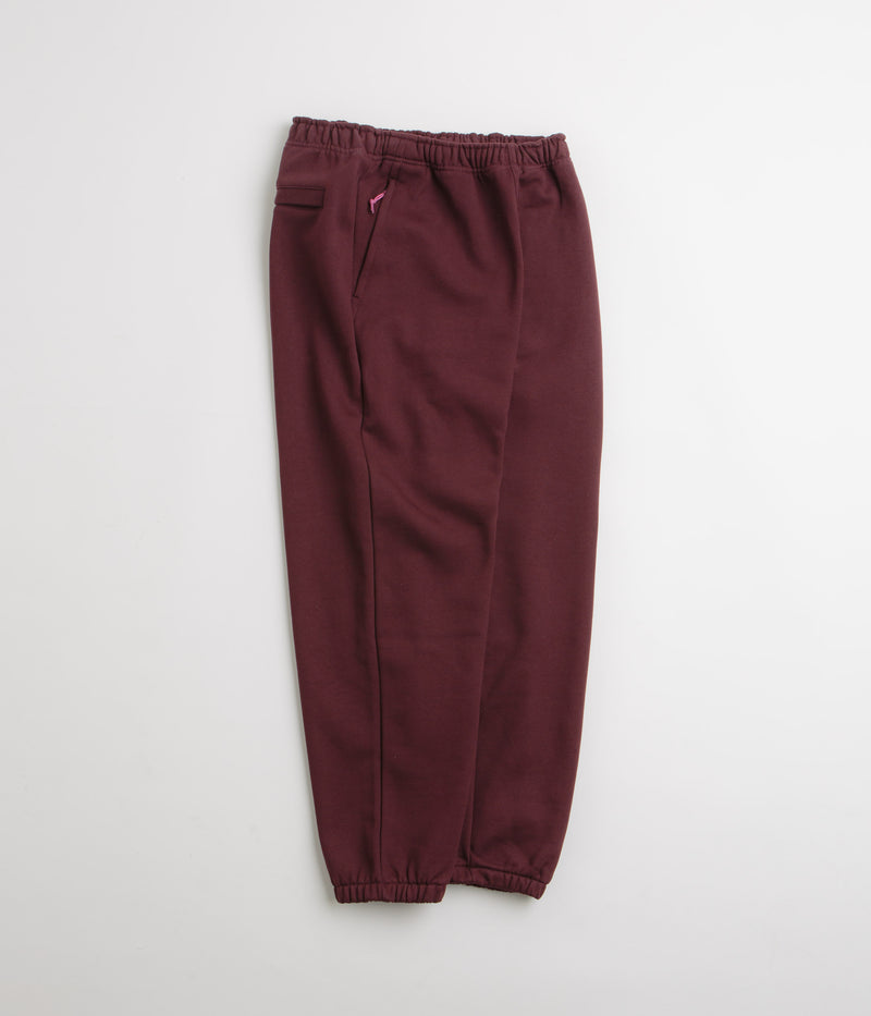 Nike ACG Tuff Fleece Lungs Pants in Burgundy Crush and Laser Fuchsia