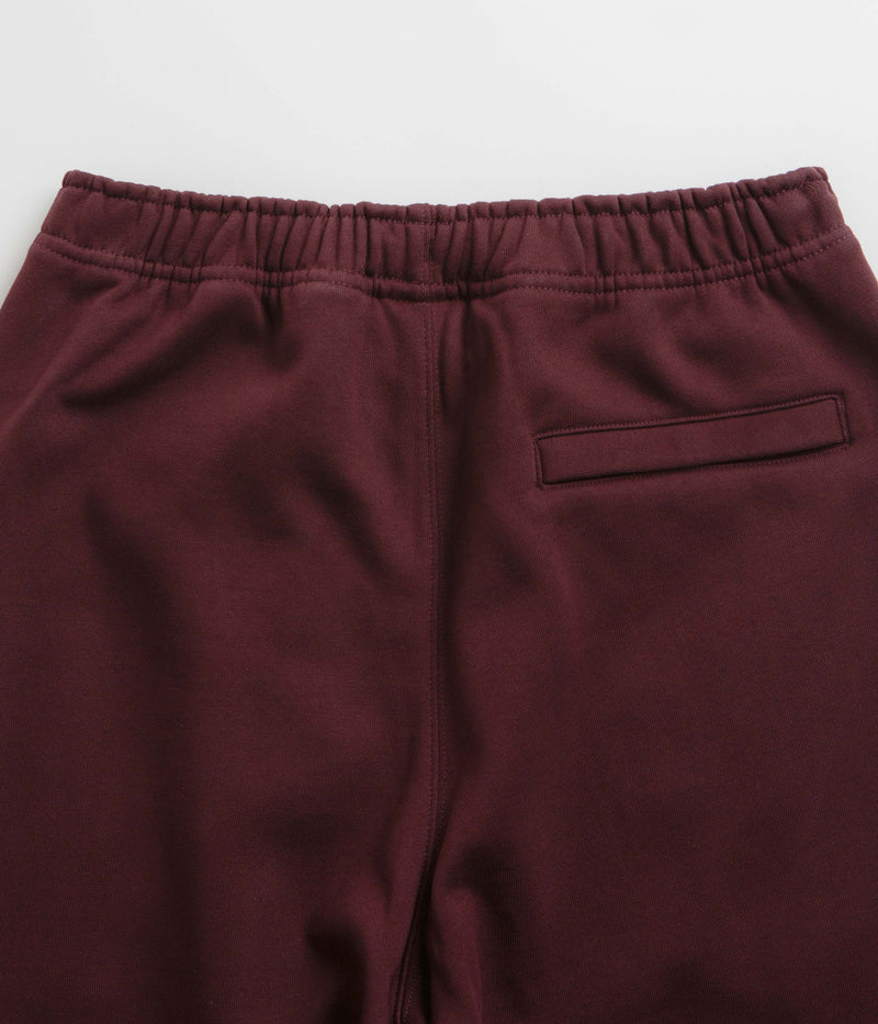 Nike ACG Tuff Fleece Lungs Pants in Burgundy Crush and Laser Fuchsia