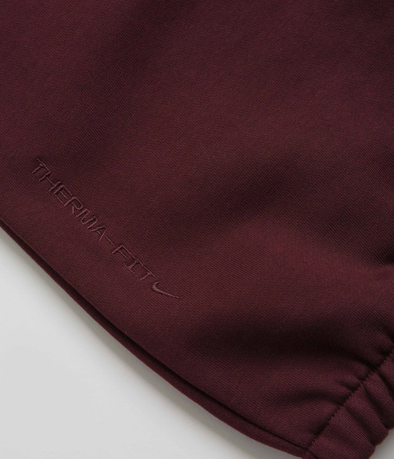 Nike ACG Tuff Fleece Lungs Pants in Burgundy Crush and Laser Fuchsia