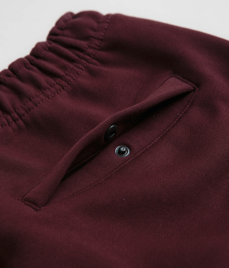 Nike ACG Tuff Fleece Lungs Pants in Burgundy Crush and Laser Fuchsia