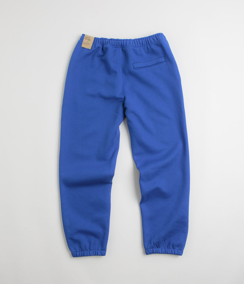 Nike ACG Tuff Fleece Lungs Pants in Game Royal and Safety Orange / Summit White