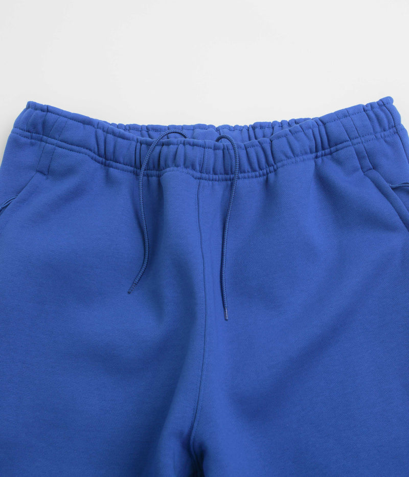Nike ACG Tuff Fleece Lungs Pants in Game Royal and Safety Orange / Summit White