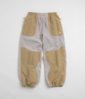 Nike ACG Wolf Tree Plus Pants in College Grey and Parachute Beige / Summit White