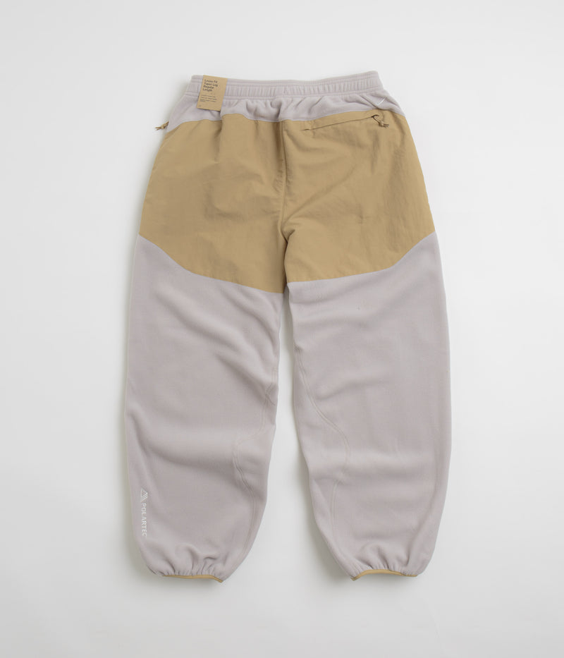 Nike ACG Wolf Tree Plus Pants in College Grey and Parachute Beige / Summit White