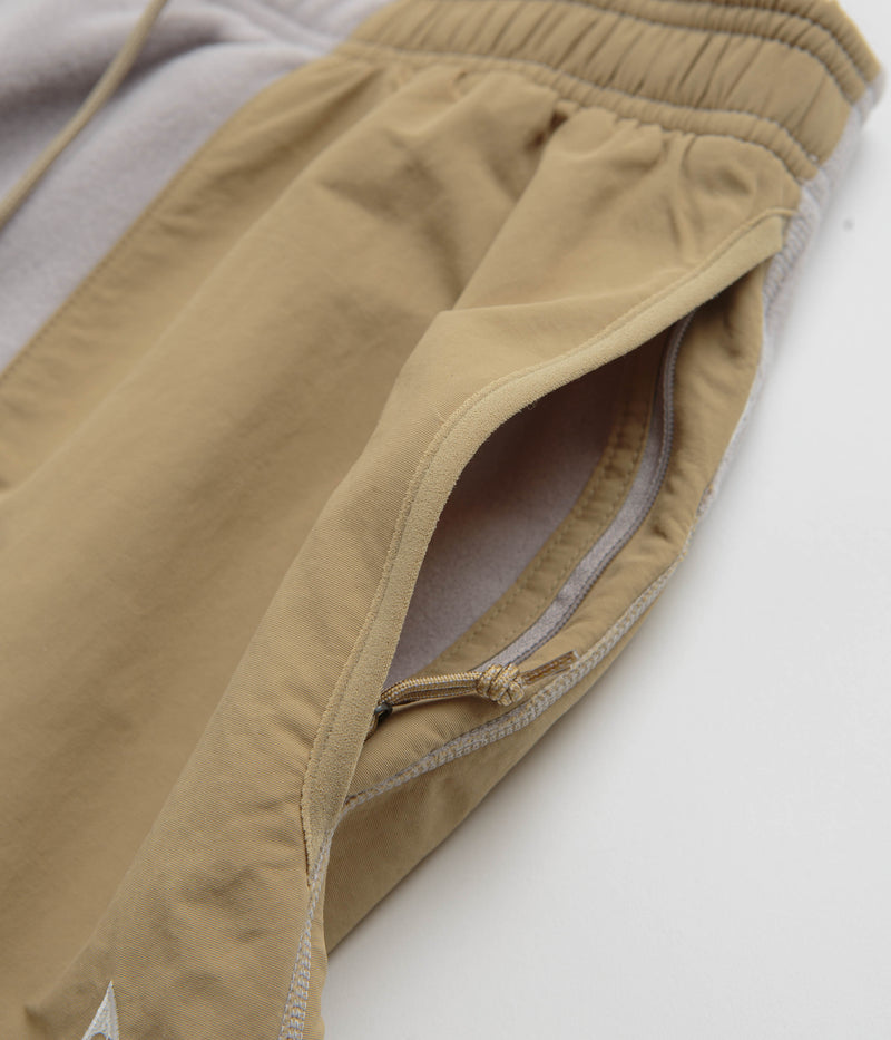 Nike ACG Wolf Tree Plus Pants in College Grey and Parachute Beige / Summit White