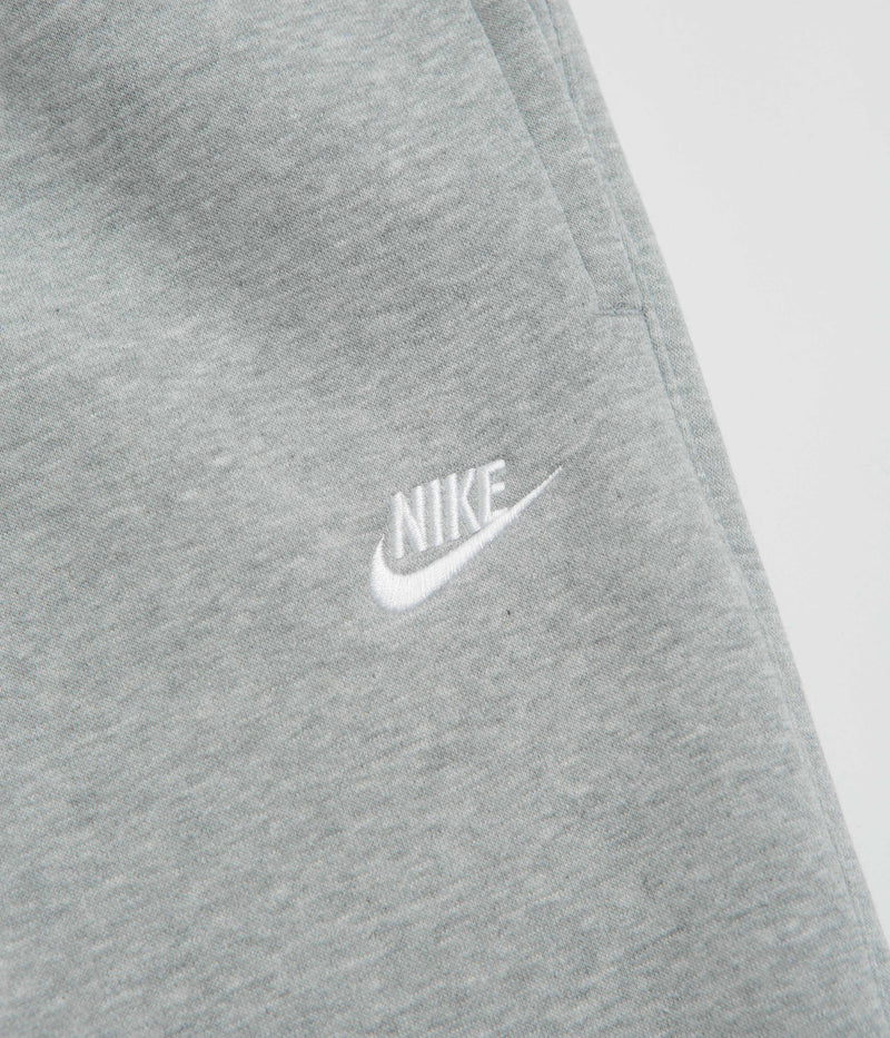 Nike Club Joggers in Dark Grey Heather and Light Smoke Grey / White