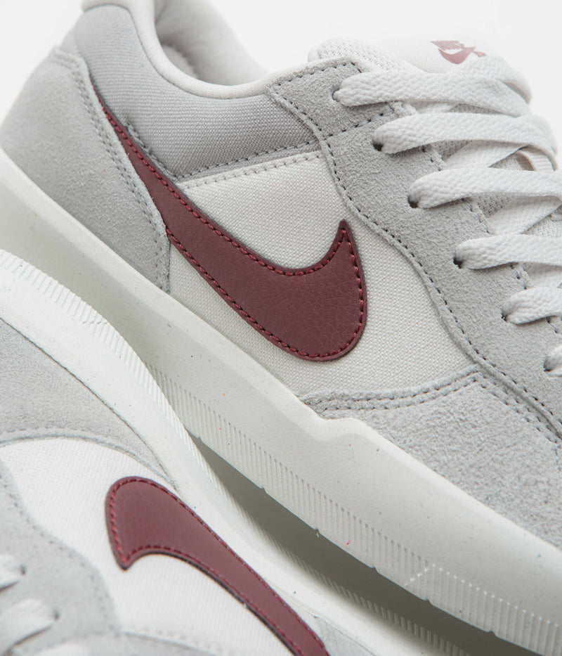 Nike SB Force 58 Shoes in Platinum Tint and Dark Team Red and Wolf Grey