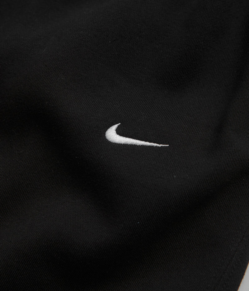 Nike Solo Swoosh Open Hem Sweatpants in Black and White