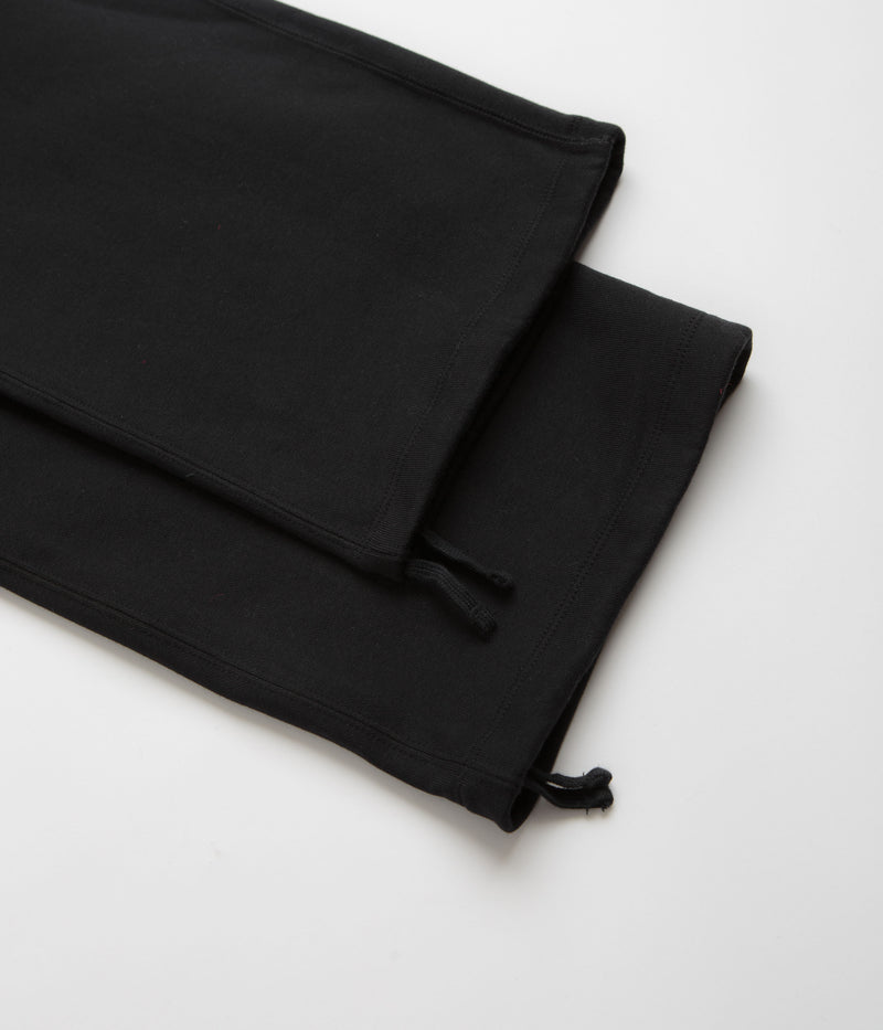 Nike Solo Swoosh Open Hem Sweatpants in Black and White