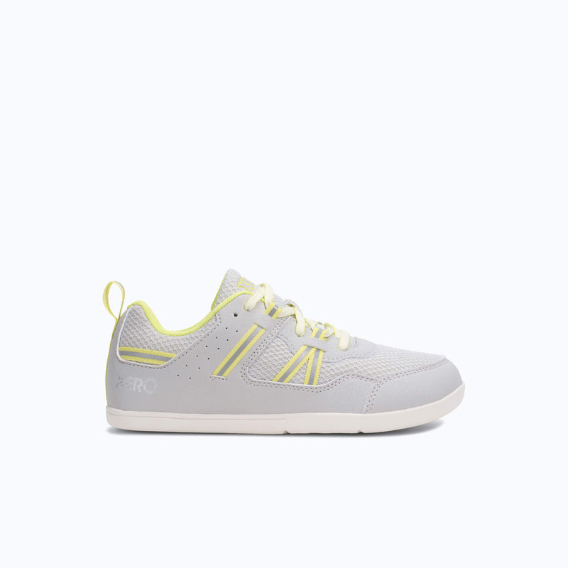 Xero Shoes Prio Big Kids Shoe in Light Gray and Yellow with Toe Facing Right