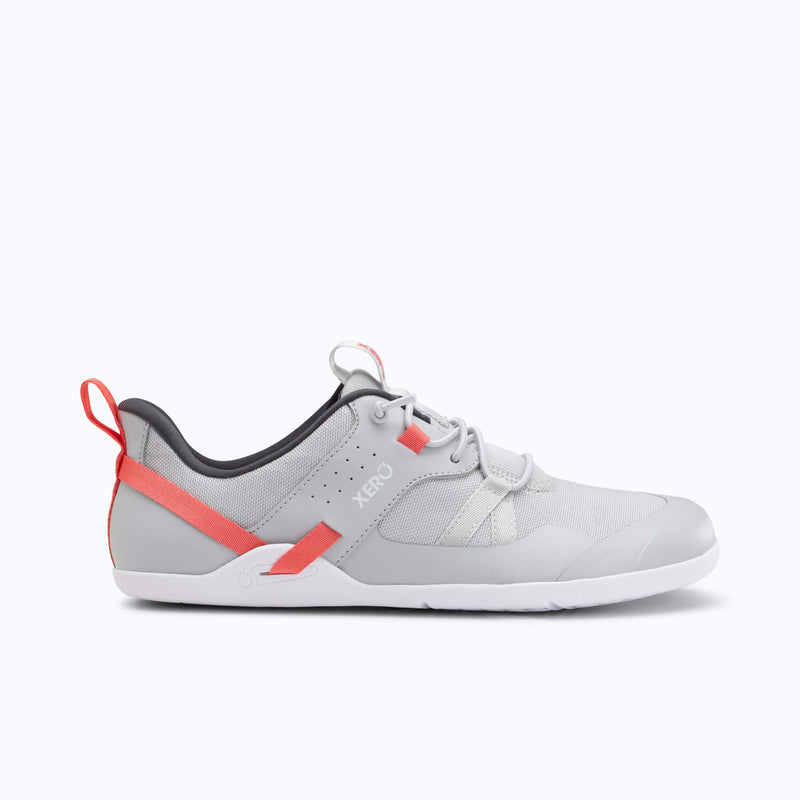 Xero Shoes Prio Coast Women Shoe in Light Gray with Red Strap that Loop Across the Side, Toe Facing Right