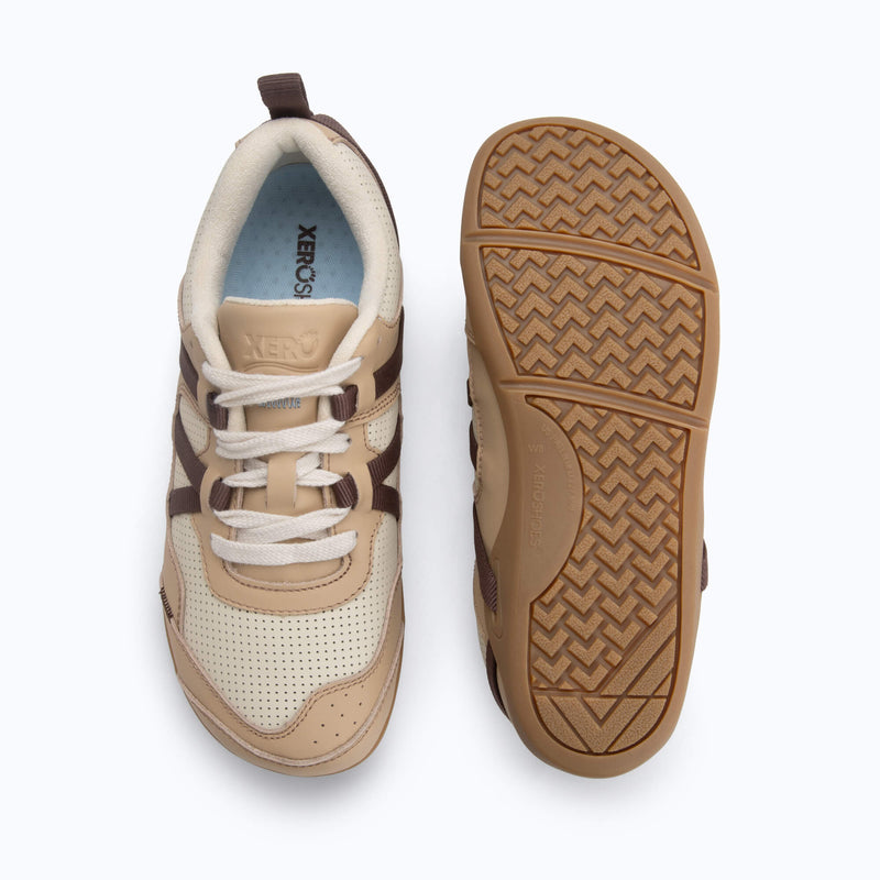 Xero Shoes Prio Leather Shoes in Cream and Brown Shown from a Top View. The Shoe on the Left Faces Upward. The Shoe on the Right is Flipped Upside Down, Displaying its Tan Rubber Outsole