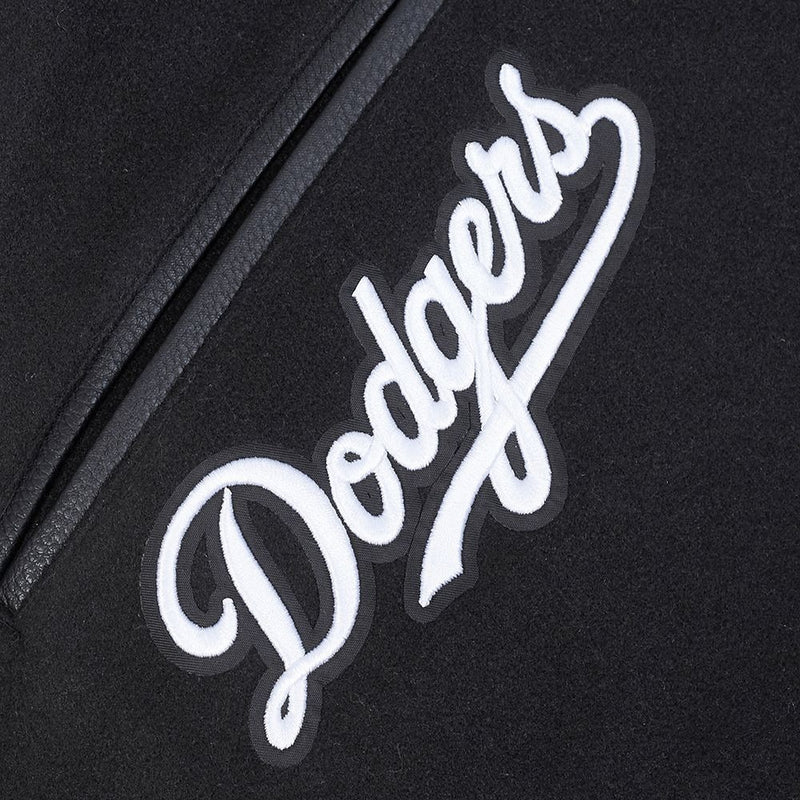 Dodgers Script Logo View of the LOS ANGELES DODGERS MEN'S VARSITY JACKET TEAM BADGE in Black