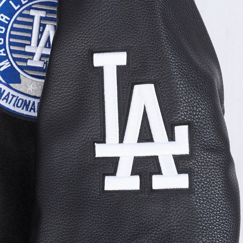 Close-Up View of the LA Logo on the LOS ANGELES DODGERS MEN'S VARSITY JACKET TEAM BADGE in Black
