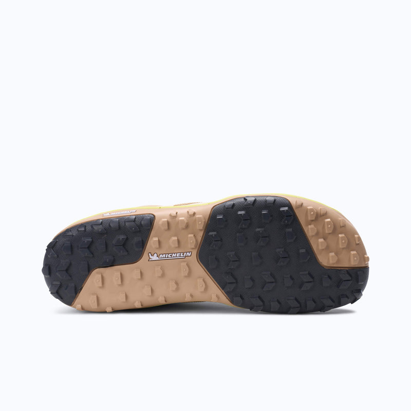 Xero Shoes Scramble Low EV Women Shoe Outsole at Tan and Black with Toe Facing Right