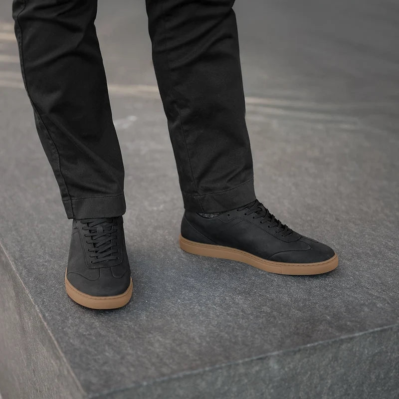 Atlas in Midnight black nubuck on model with black chinos